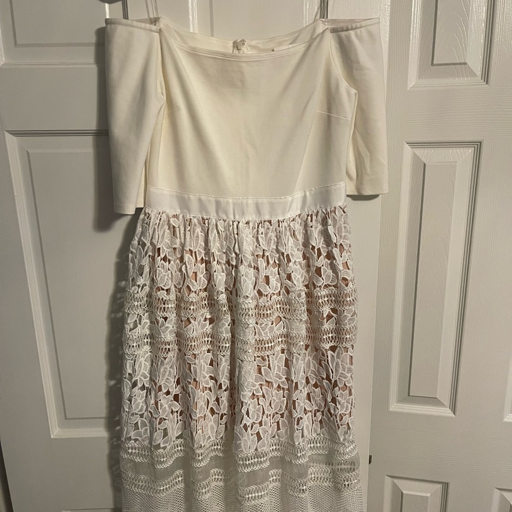 Off the shoulder white dress with beautiful crochet bottom half